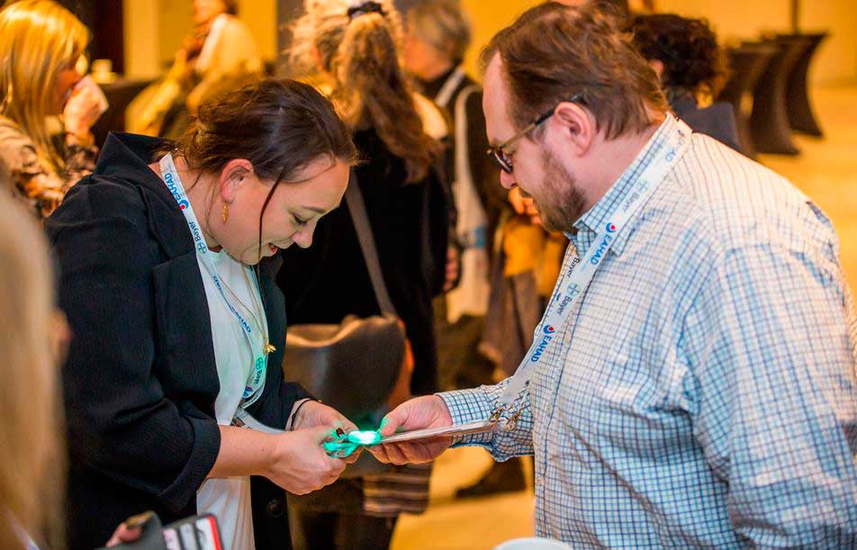 Professionals interacting at a previous EAHAD Congress.